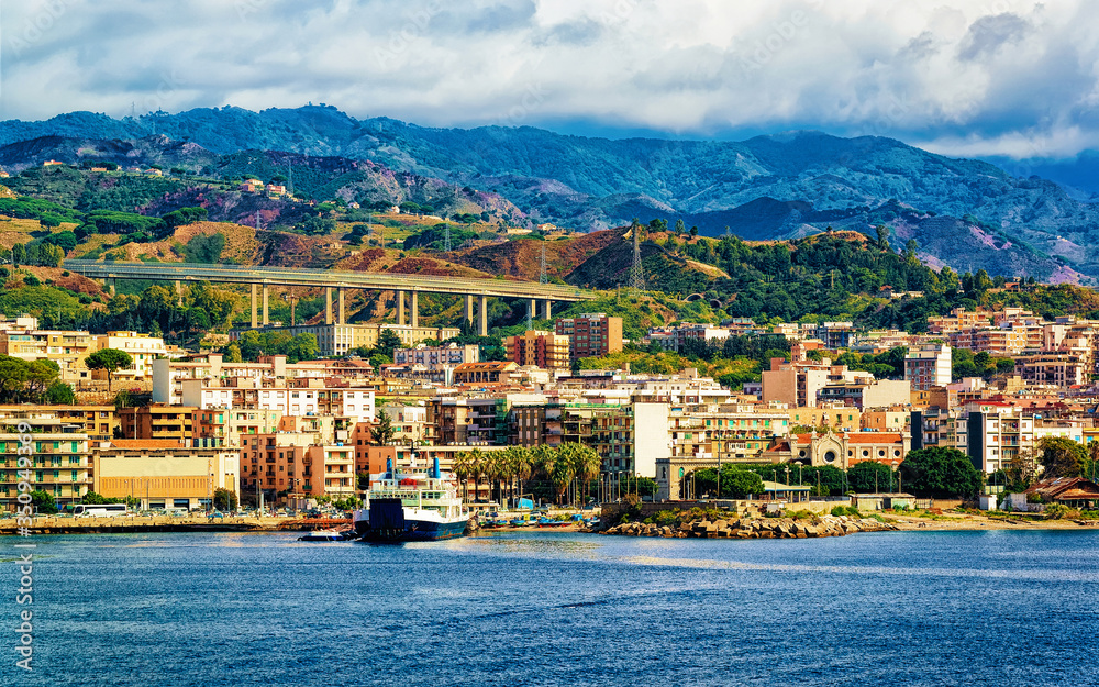 Cityscape of Messina and  Mediterranean Sea on Sicily island reflex
