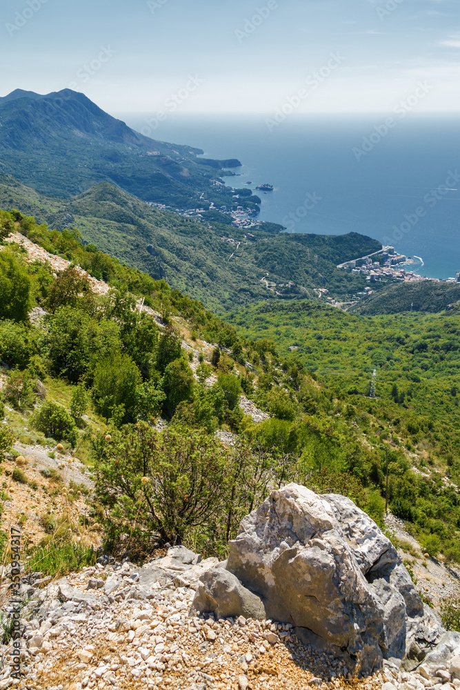 Sunny aerial panoramic view of old town of  Budva and Riviera, Montenegro.