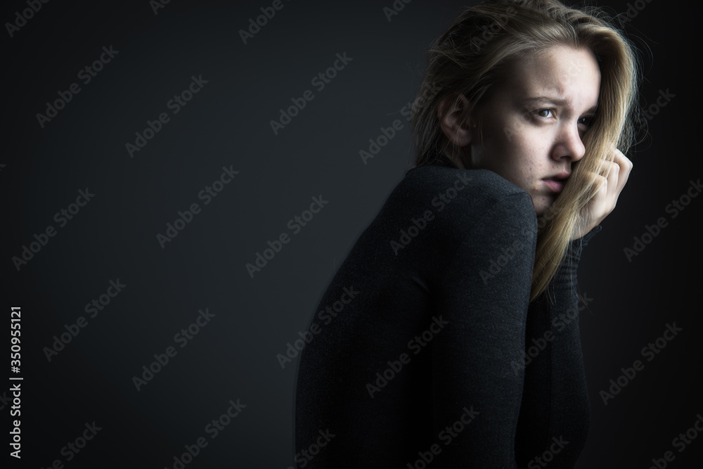 Young woman suffering from a severe depression/anxiety