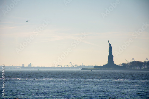 statue of liberty at sunset