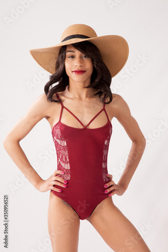 Lovely woman in a bathing suit with her hand on her hip