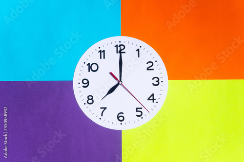 White dial clock and place for schedule or day mode