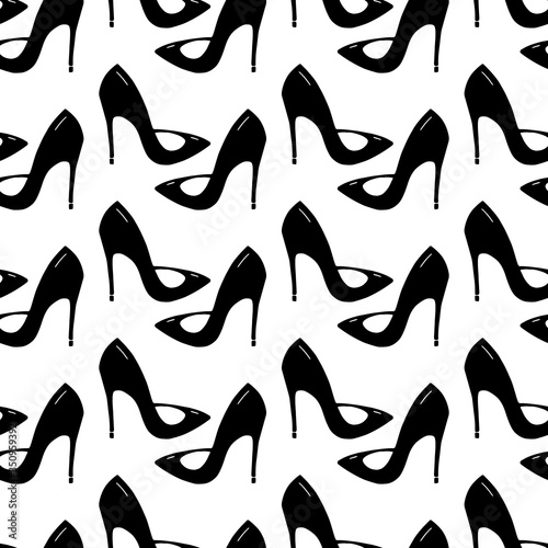 Seamless pattern made from doodle stilettos shoes. Isolated on white background. Vector stock illustration.