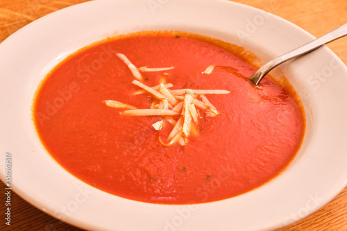 Tomato soup on white plate