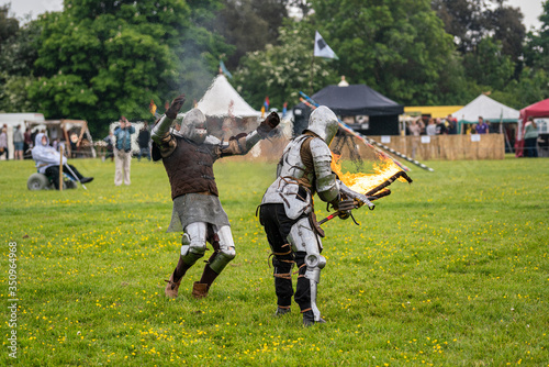 Knight disarmed fighting with Fire