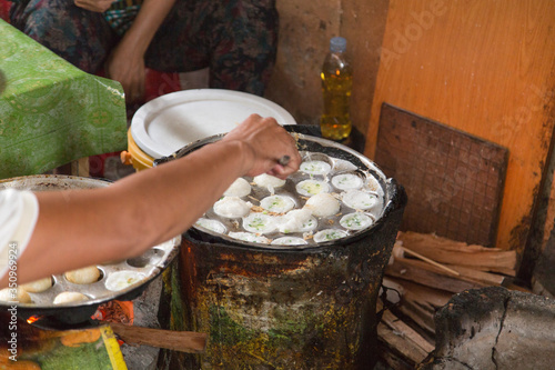 Typical coconut pancakes cooked in the alleys of central Phnom Penh