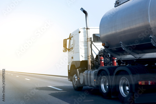 Gas Truck on highway road with tank oil container, transportation concept.,import,export logistic industrial