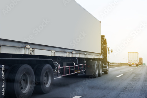 Truck on highway road with white container, transportation concept.,import,export logistic industrial Transporting Land transport on asphalt expressway