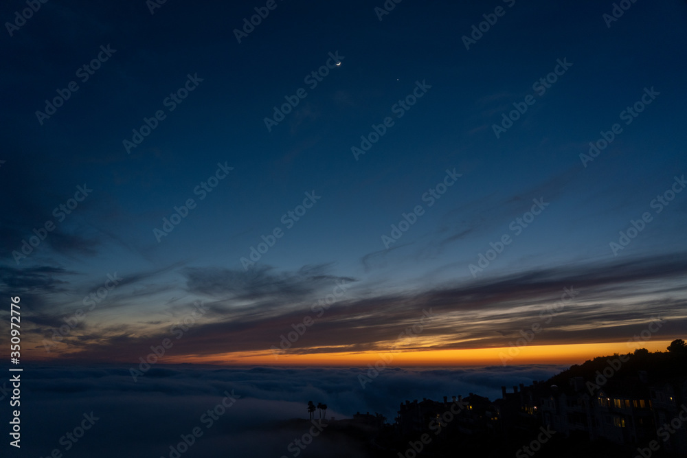 Sunset over the clouds in Laguna Beach California