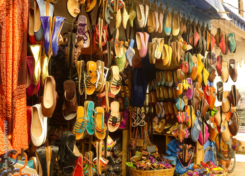 Market with hanging colourful shoes