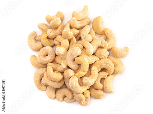 A Pile of Raw Natural Cashew Nuts Isolated on a White Background