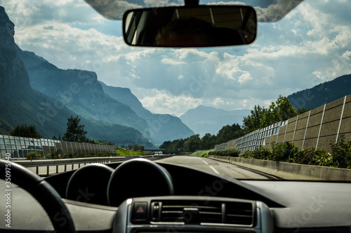 View from the car to the beautiful french alps mountains in sunny day © sebastianosecondi