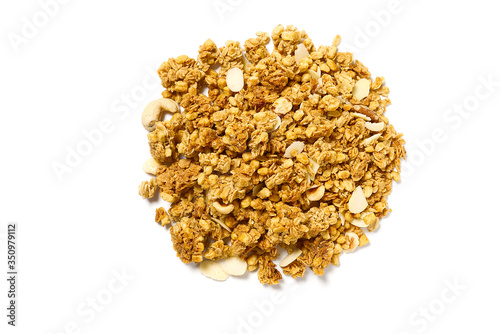 Small Granola Pile on a White Background. Small Muesli Pile with nuts isolated on white