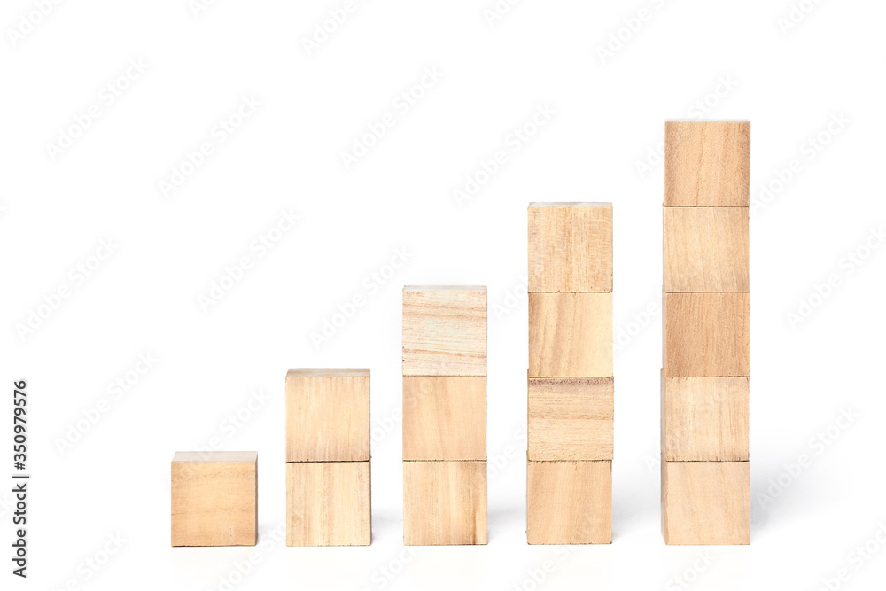 Graphs chart wooden cube block on a white background. Shopping, sale, finance, and business concept. Graphs chart wooden cube block on a white background. Shopping, sale, finance, and business concept.