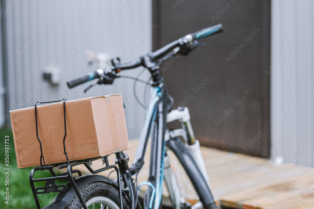 pandemic home delivery of food by bicycle. social distancing for infection risk pandemic home delivery of food by bicycle. social distancing for infection risk