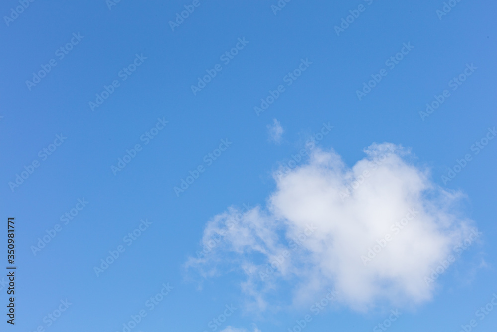 Small cloud on a blue sky background
