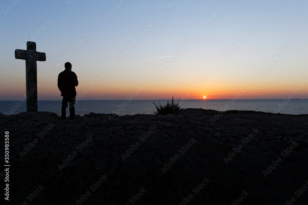 A Man watching Sunset