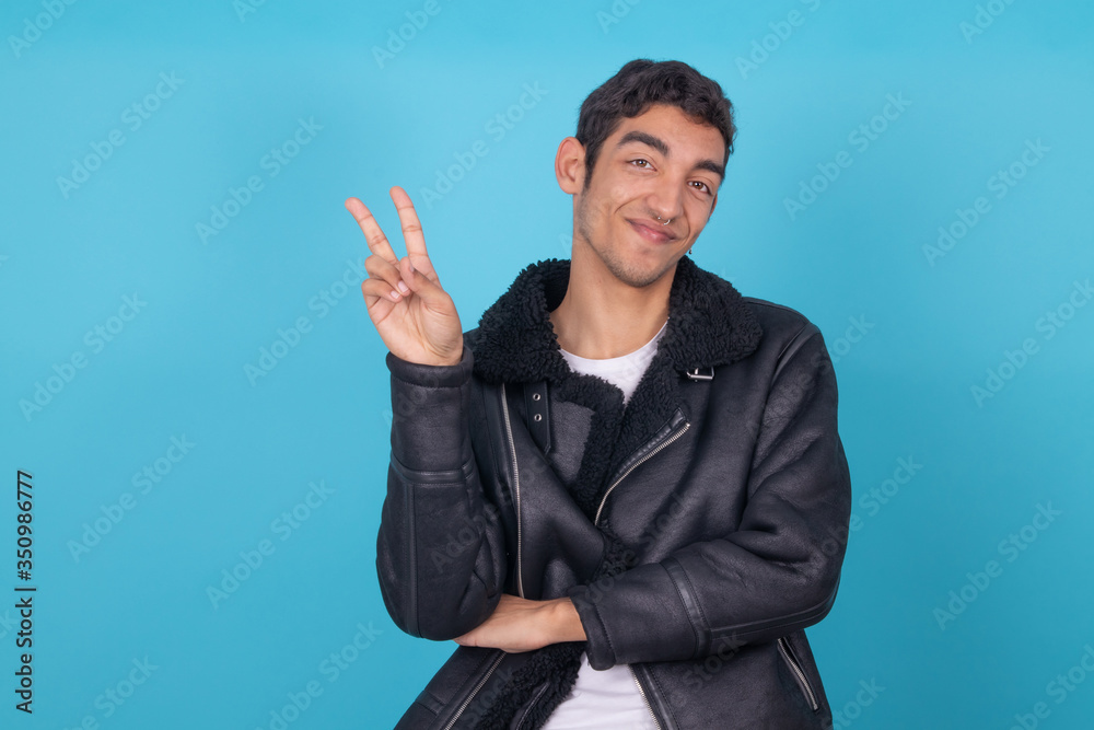 fashionable young man isolated on color background fashionable young man isolated on color background