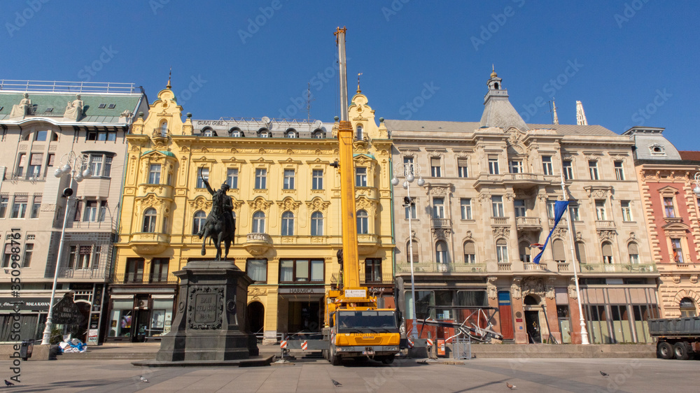 Zagreb/ Croatia-May 4th,2020: Empty main square during corona virus restrictive measures and after strong earthquake that made heavy machinery remove loose and broken building parts
