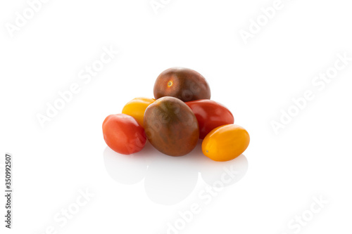Cherry tomatoes. Colored cherry tomatoes, on a white background. (Tr - kiraz domates)