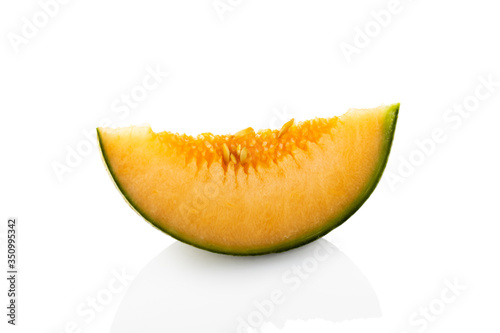 Melon. A slice of melon on a white background. (Tr - kavun) 