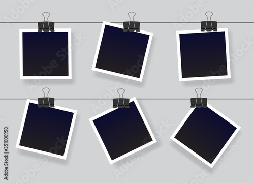 Blank instant photo frame set hanging on a clip. Black empty vintage photoframe templates. Vector illustration isolated on grey background.	