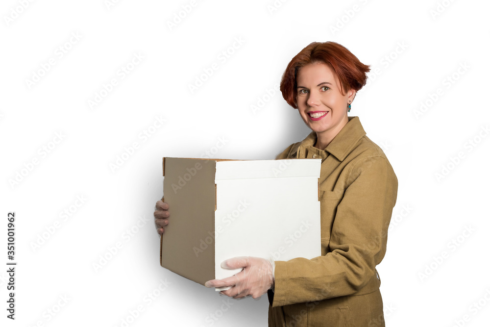 Delivery woman employee in uniform gloves hold empty cardboard box. Banner Delivery woman employee in uniform gloves hold empty cardboard box. Banner