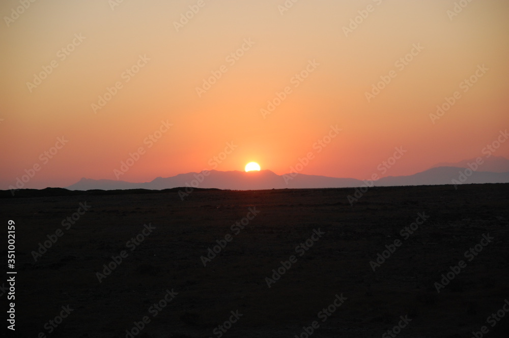 This stock photo is from the sunrise at the south Crete Island in Greece during summertime.