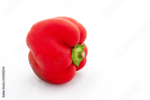 red bell pepper on white background © Rafael