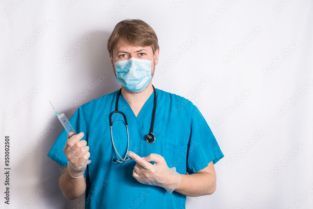 Heeling Injection. Senior Grey Hair Doctor In Surgical Mask Holding A Syringe Heeling Injection. Senior Grey Hair Doctor In Surgical Mask Holding A Syringe