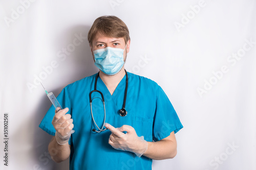 Heeling Injection. Senior Grey Hair Doctor In Surgical Mask Holding A Syringe