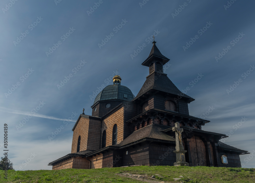Brown wooden old chapel on Radhost hill in Beskydy mountains