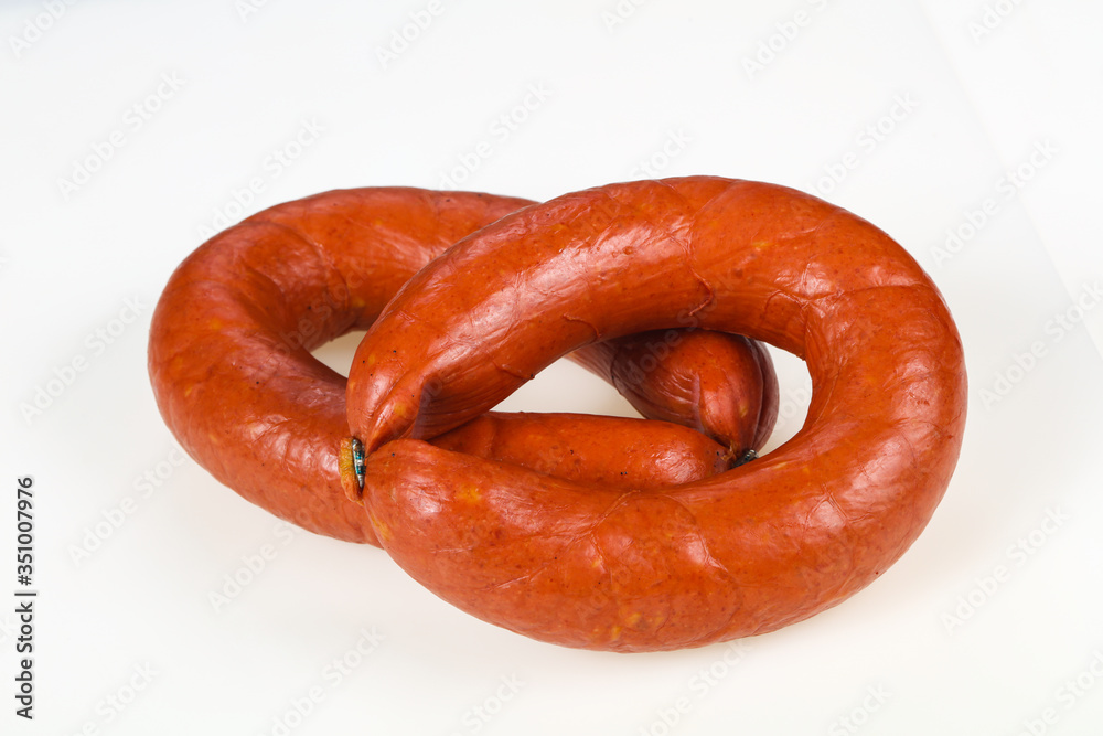Tasty meat sausages over white background Tasty meat sausages over white background