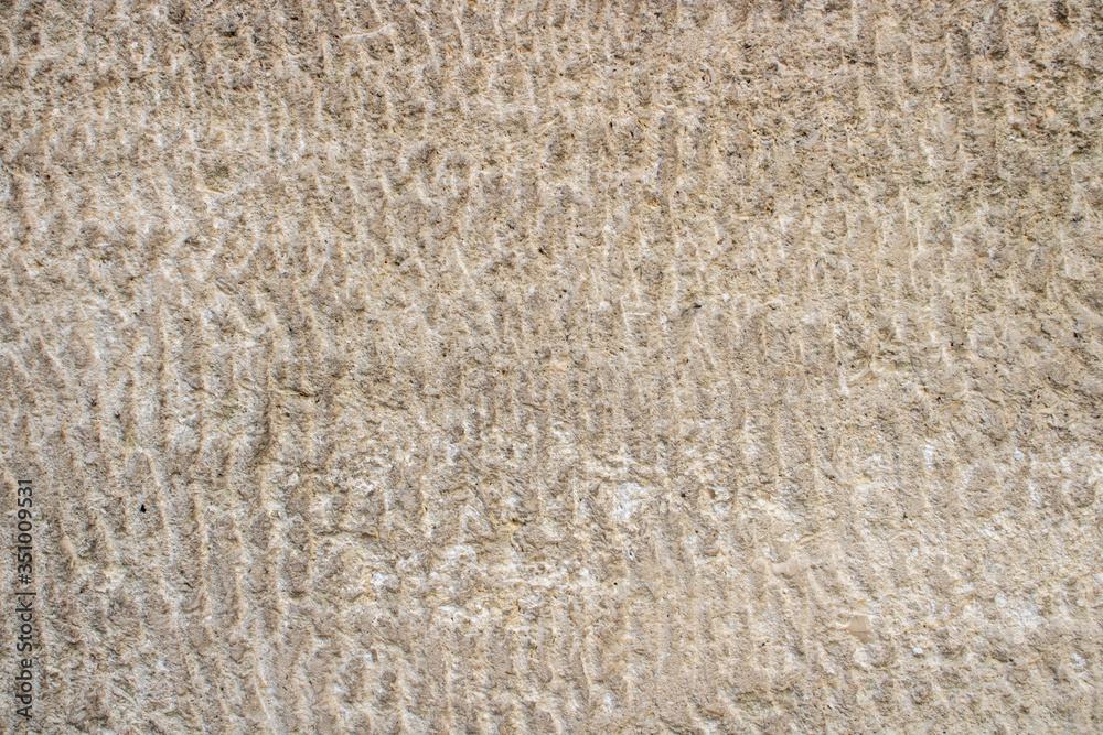Hand carved old stone as background, pattern or texture Hand carved old stone as background, pattern or texture