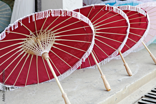 Bosang umbrella festival,Women in traditional costume during the annual Umbrella festival at San Kamphaeng in Chiang Mai, Thailand.  photo