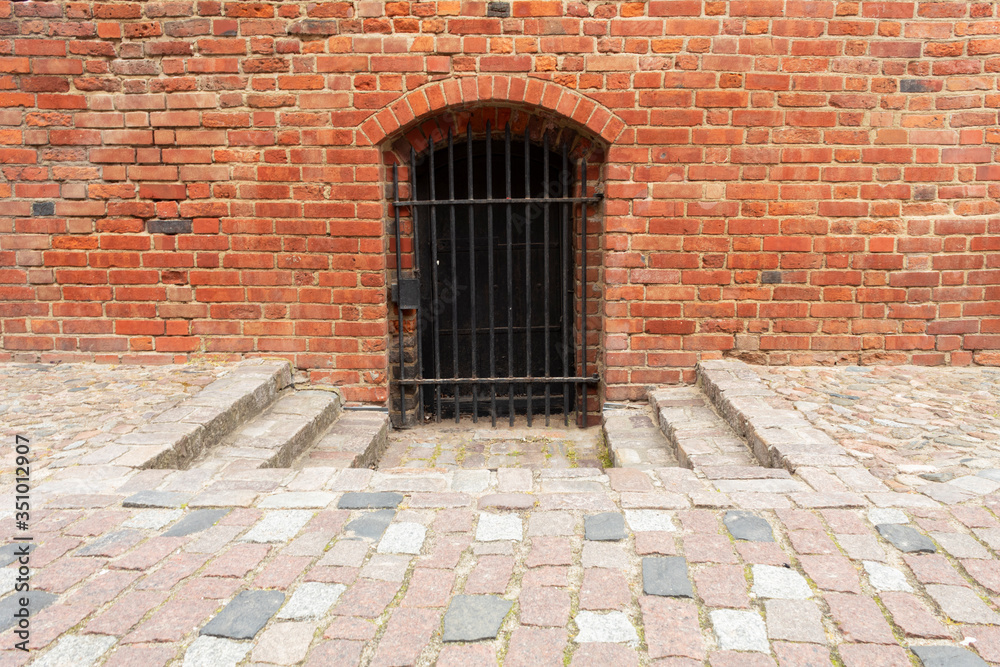 Door in the wall of an old castle Door in the wall of an old castle