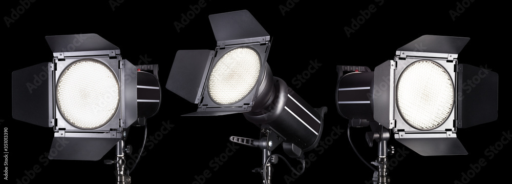 Studio Flash Color Set of photography studio flash isolated on black background with lamp ...
