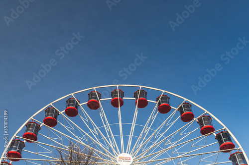 ferris wheel on blue sky