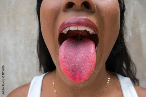 Fototapeta African-American woman with tongue out