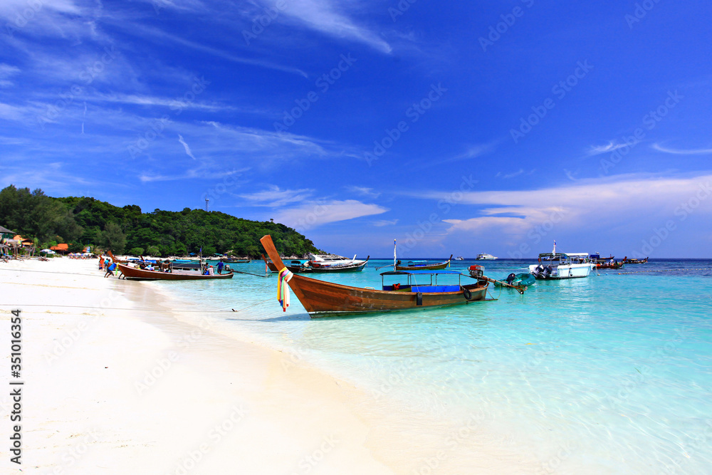 Longboats and scenic view on Koh Lipe beach Andaman Sea, Satun province, Thailand Longboats and scenic view on Koh Lipe beach Andaman Sea, Satun province, Thailand