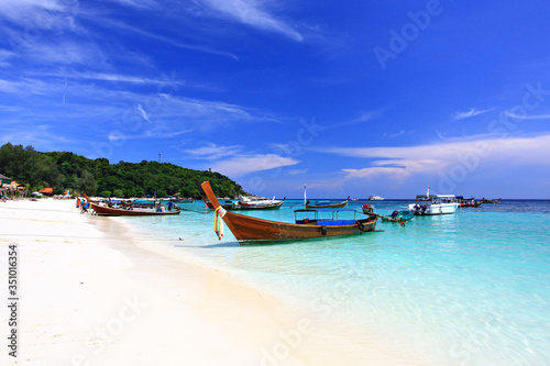Longboats and scenic view on Koh Lipe beach Andaman Sea, Satun province, Thailand 