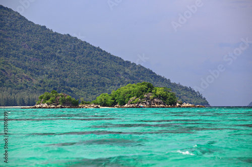 Longboats and scenic view on Koh Lipe beach Andaman Sea, Satun province, Thailand 