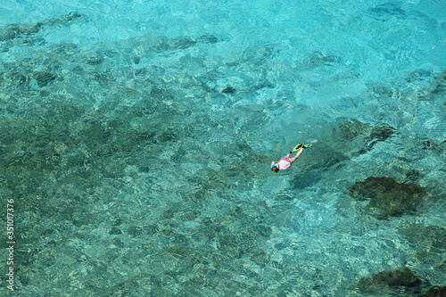 Tourists floating on the crystal clear waters. Enjoy the beauty of the sea at Similan sea 