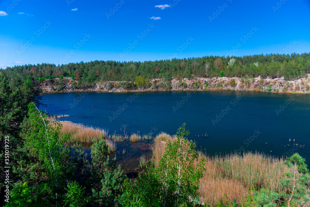 Beautiful view of the flooded granite quarry.