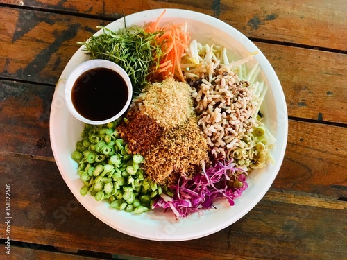 Spicy Rice Salad with Vegetable  is a local food in southern Thailand. Is a food that has nutritional benefits Has a high nutritional value