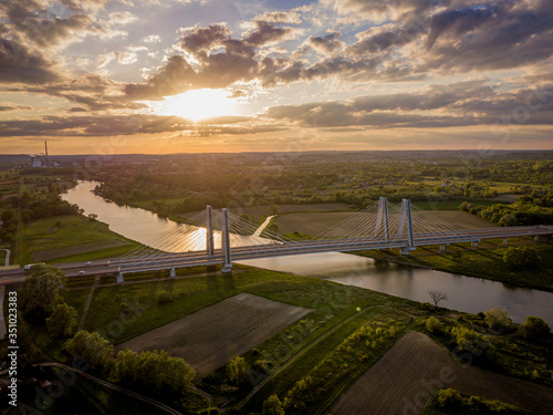 Bridge of Cardinal Franciszek Macharski in Krakow at sunset.