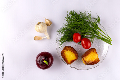 Vegetables; ingredients; fresh; boiled; greens;carrots; top view; close-up; place for inscription. photo