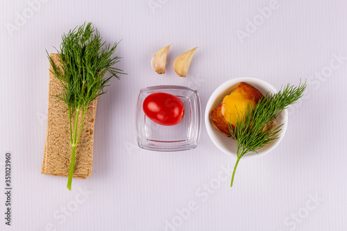 Vegetables; ingredients; fresh; boiled; greens;carrots; top view; close-up; place for inscription. photo