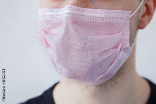 young man in medical mask