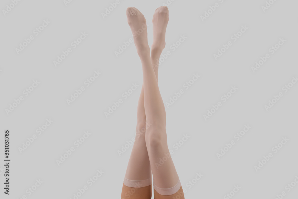 Compression stockings in grey background Compression stockings in grey background